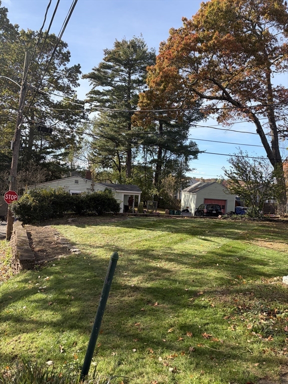 11 Cogswell Road North Reading, MA 01864 - Photo 4 of 29 a swimming pool is in the middle of a lake