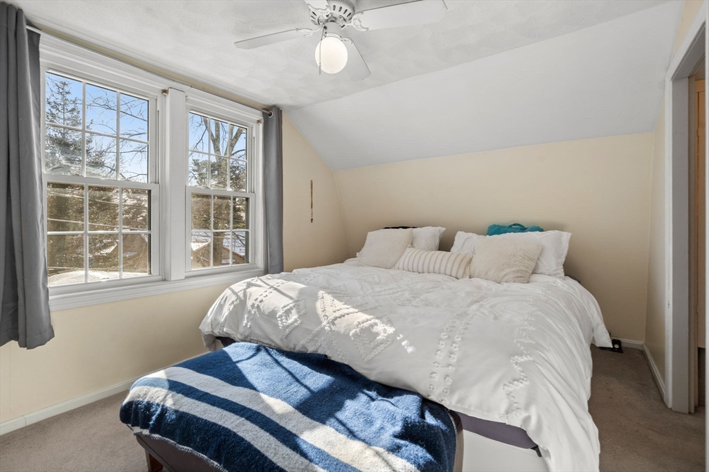 11 Cogswell Road North Reading, MA 01864 - Photo 9 of 29 a bedroom with a bed and window