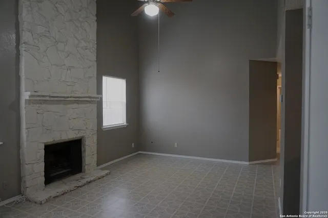 a view of a livingroom with a fireplace
