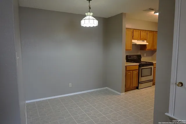 a view of a kitchen with a sink