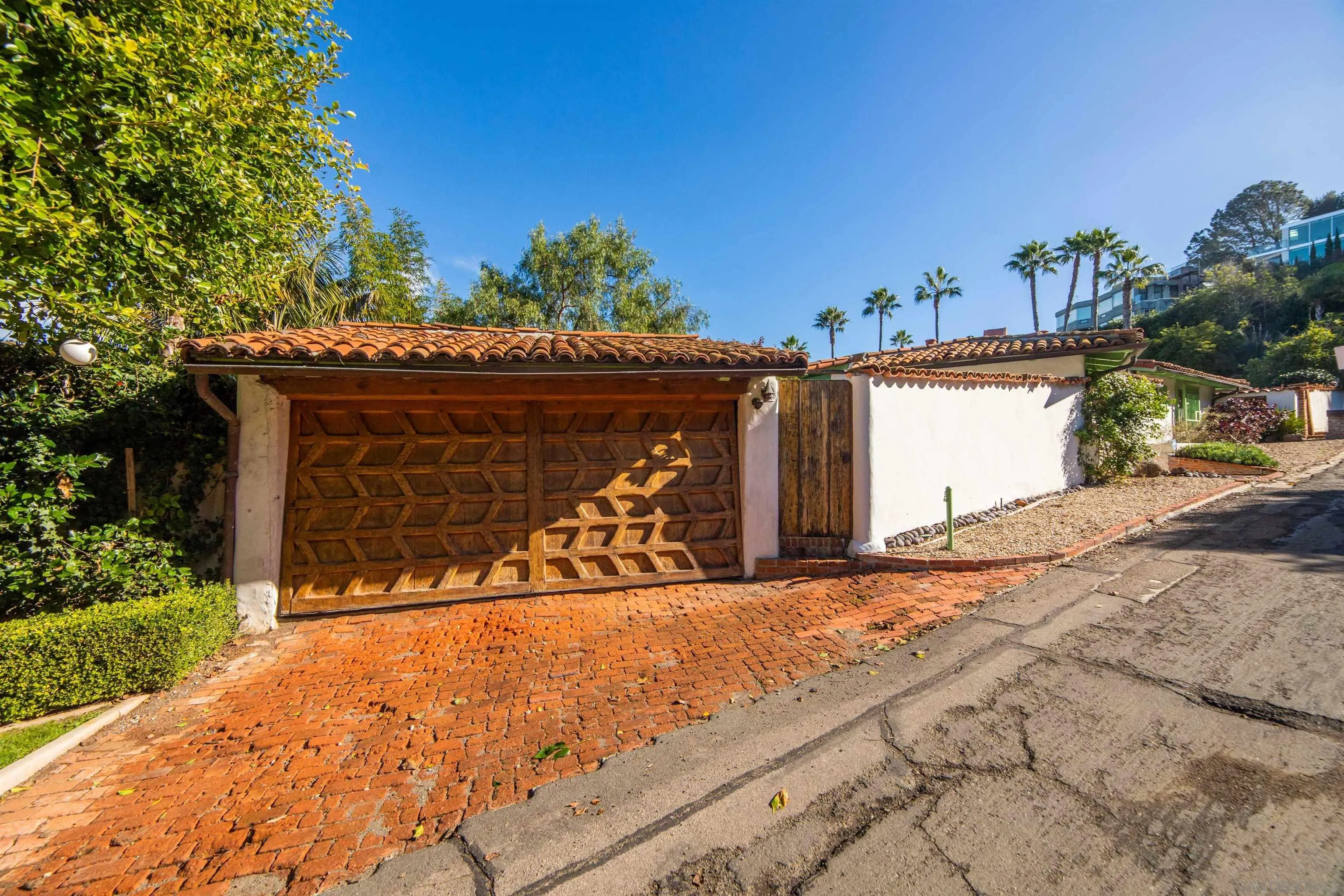 7477 Hillside Drive La Jolla, CA 92037 - Photo 23 of 25 a view of a house with a outdoor space