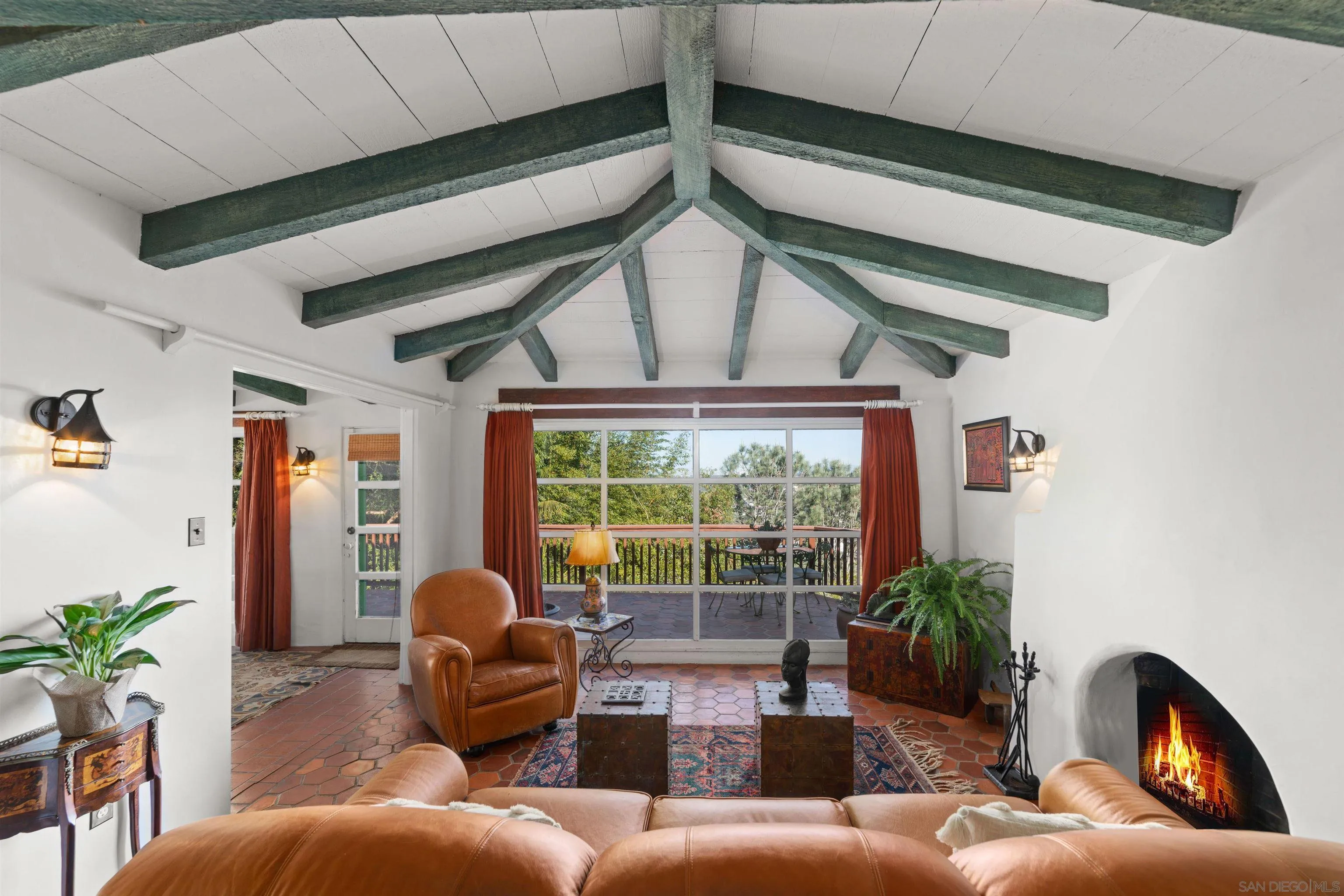 7477 Hillside Drive La Jolla, CA 92037 - Photo 4 of 25 a living room with furniture and a large window