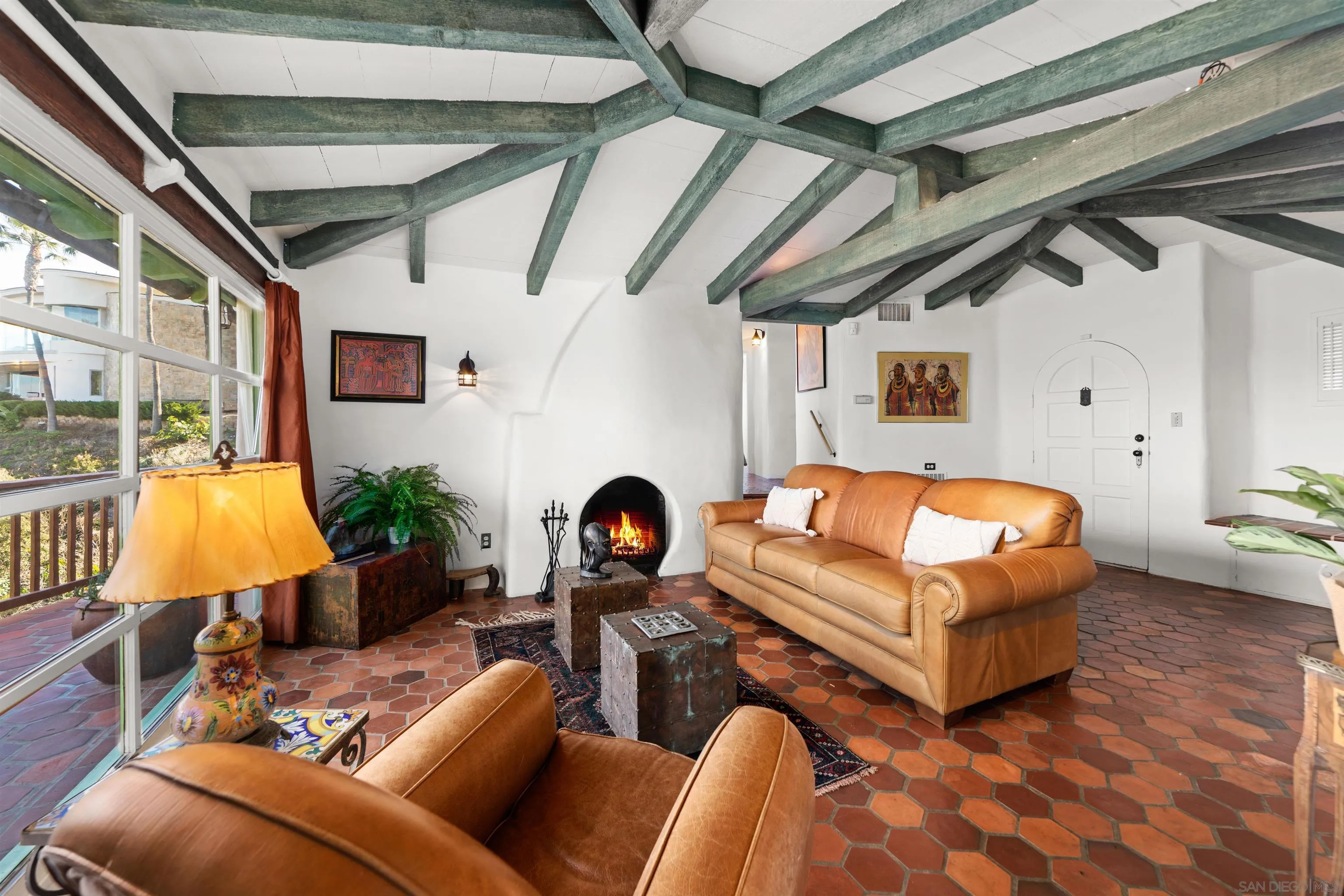 7477 Hillside Drive La Jolla, CA 92037 - Photo 5 of 25 a bedroom with furniture and a large window