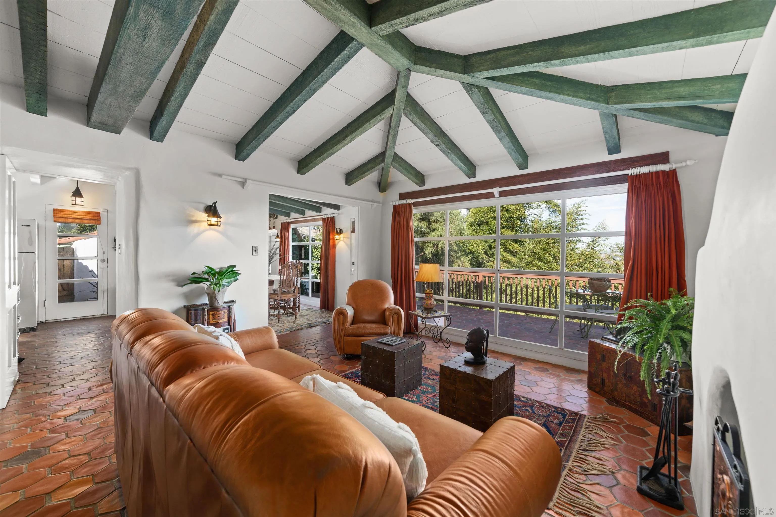 7477 Hillside Drive La Jolla, CA 92037 - Photo 6 of 25 a living room with furniture and a floor to ceiling window