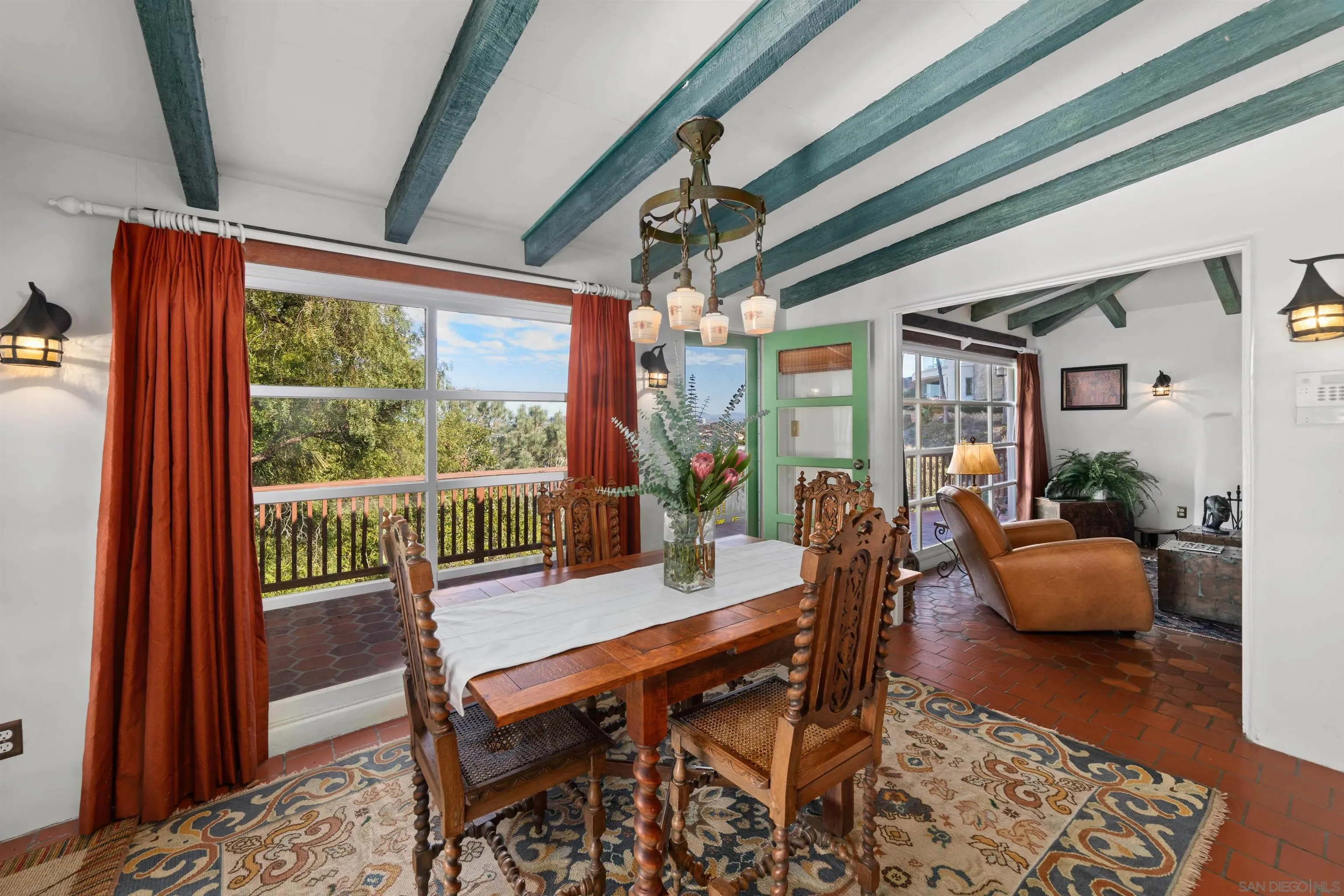 7477 Hillside Drive La Jolla, CA 92037 - Photo 7 of 25 a dining room with furniture and wooden floor
