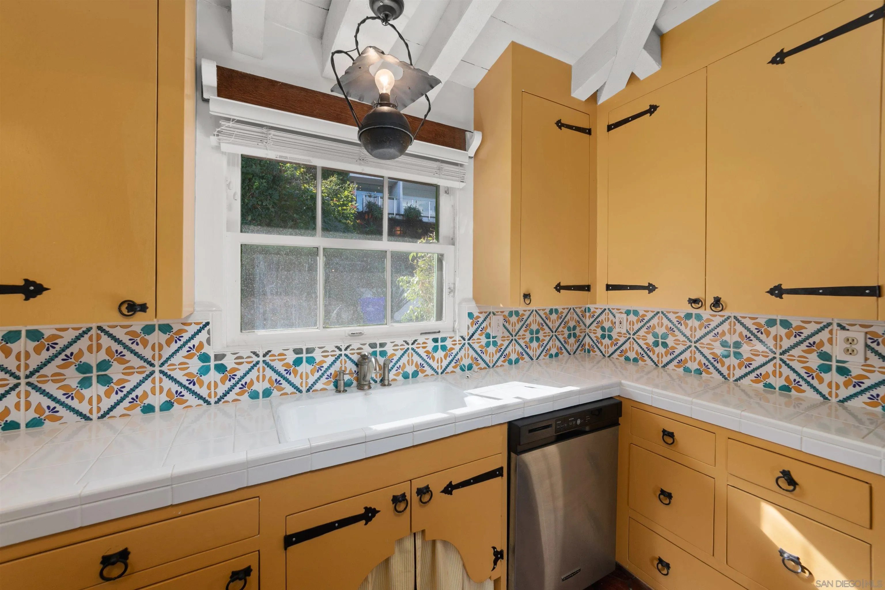7477 Hillside Drive La Jolla, CA 92037 - Photo 9 of 25 a bathroom with a sink and a mirror