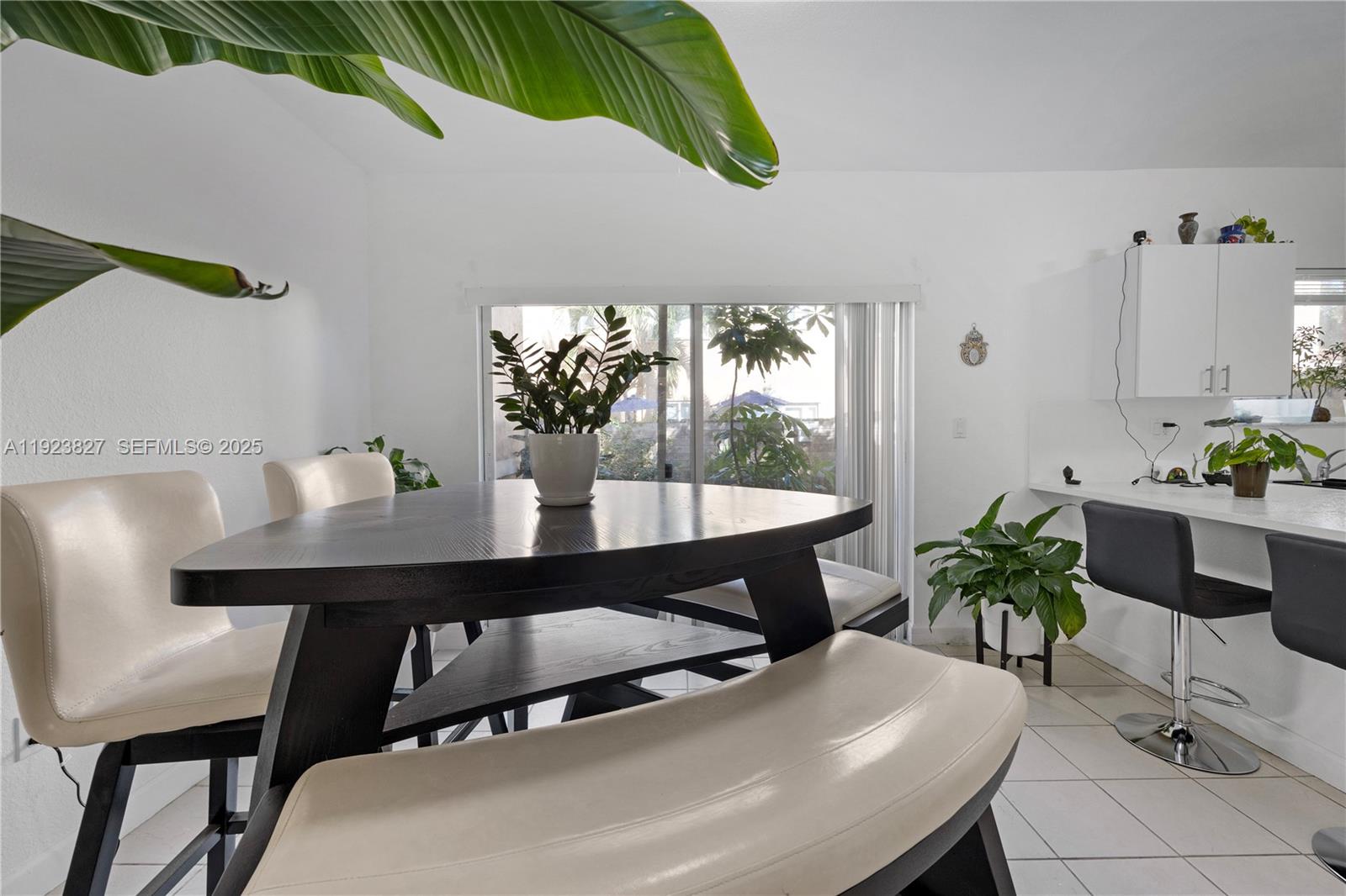 8525 Southwest 214th Terrace Cutler Bay, FL 33189 - Photo 28 of 35 a view of a dining room with furniture