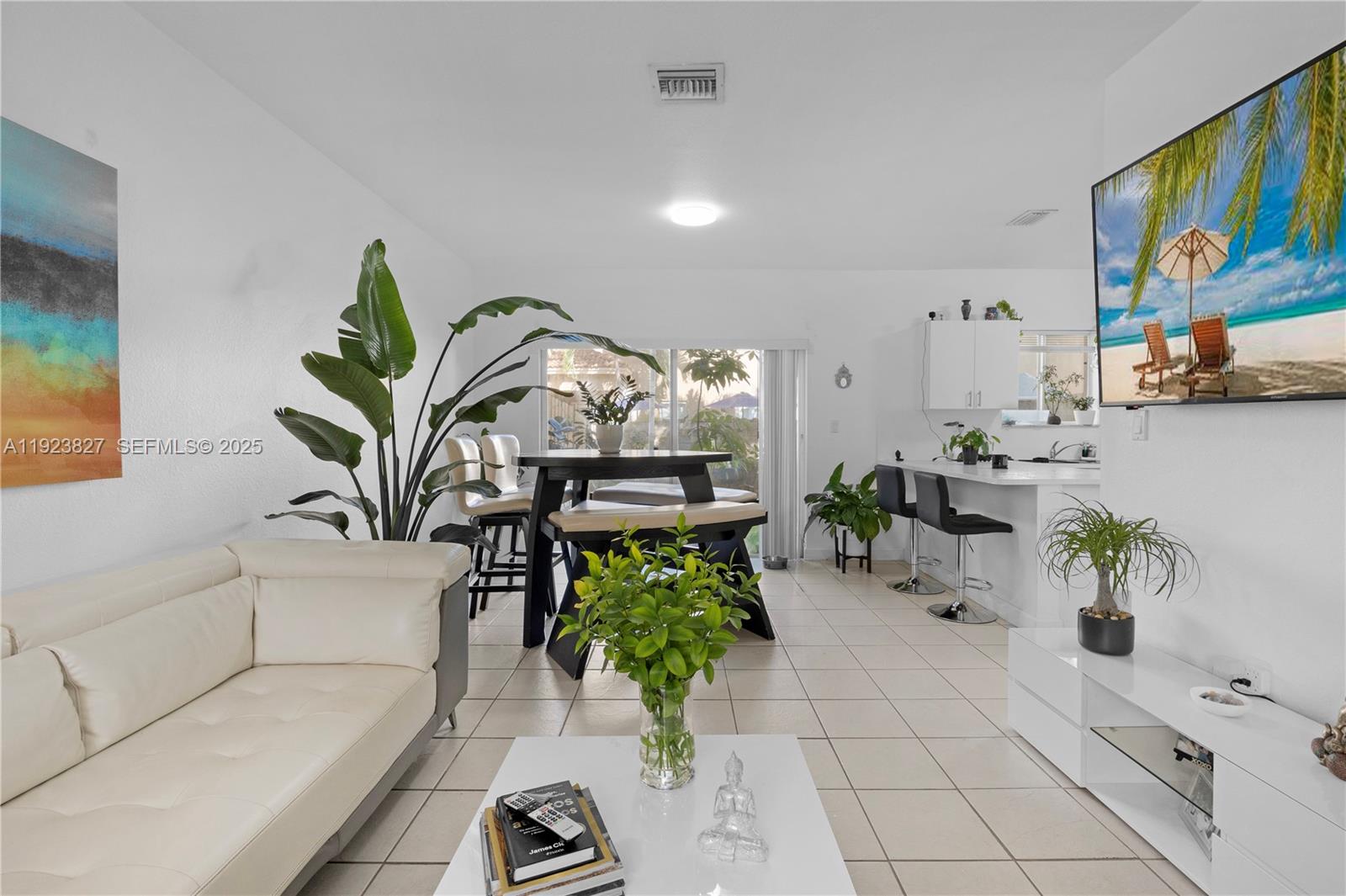 8525 Southwest 214th Terrace Cutler Bay, FL 33189 - Photo 30 of 35 a living room with furniture flowerpot and flower pot