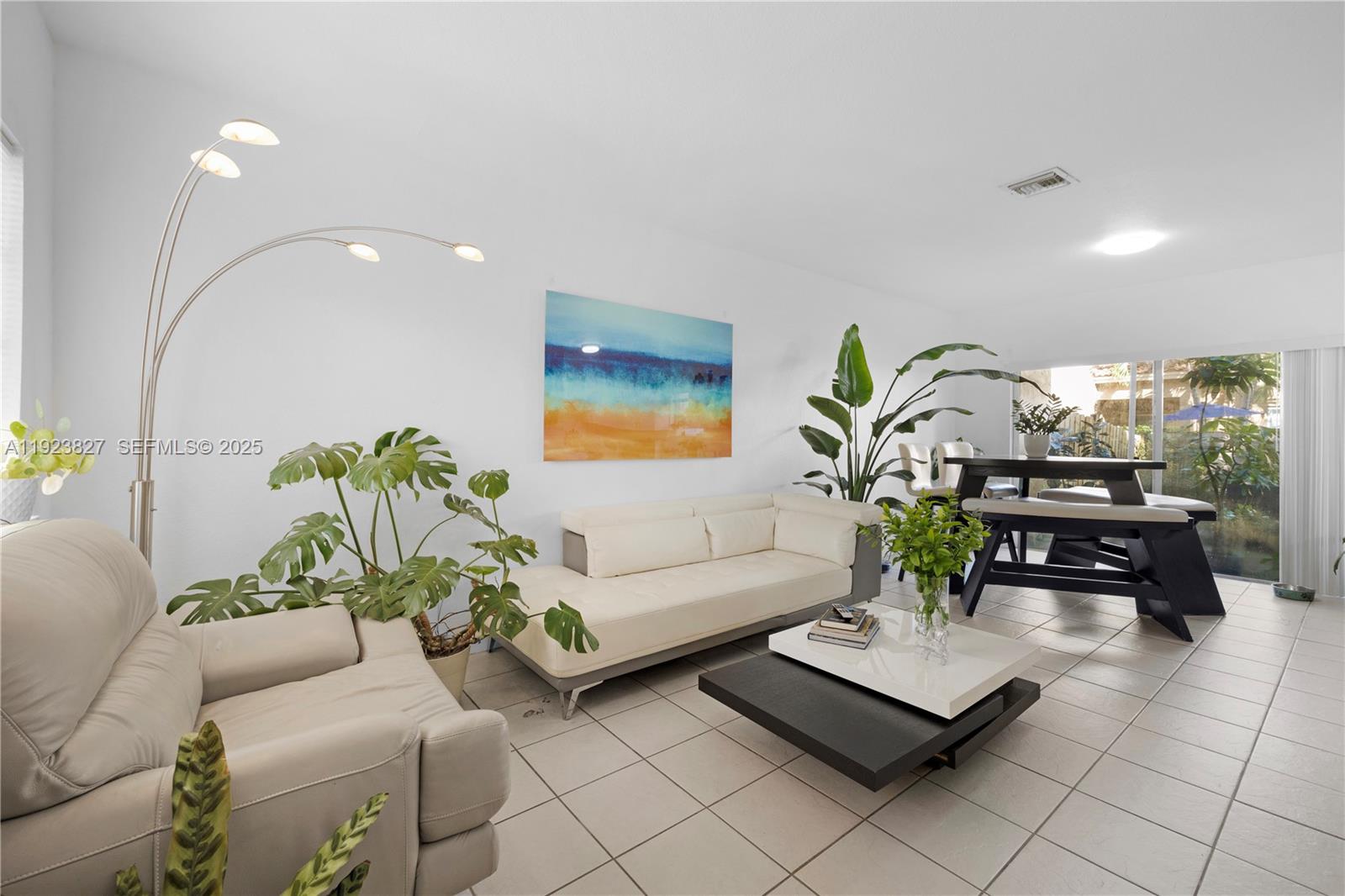 8525 Southwest 214th Terrace Cutler Bay, FL 33189 - Photo 31 of 35 a living room with furniture