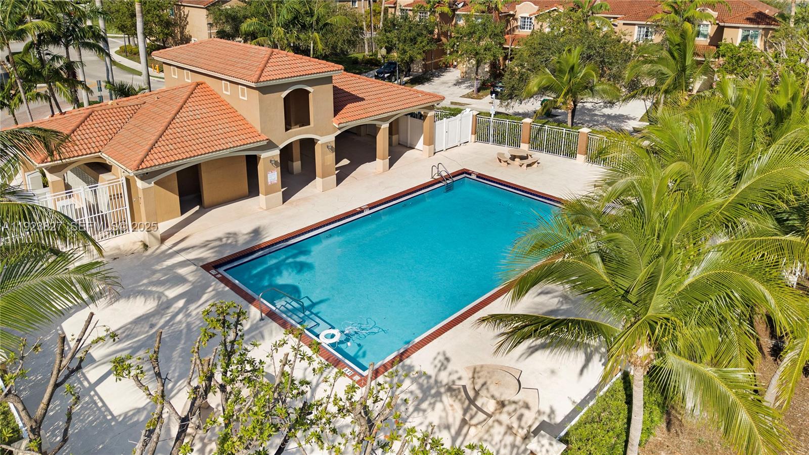 8525 Southwest 214th Terrace Cutler Bay, FL 33189 - Photo 34 of 35 a view of a white house with a yard