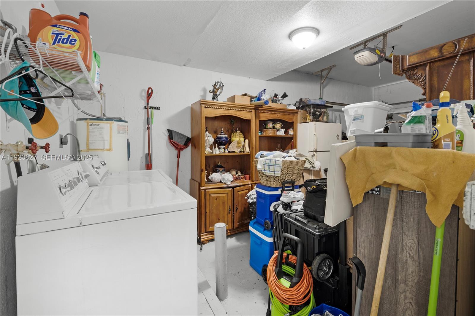 8525 Southwest 214th Terrace Cutler Bay, FL 33189 - Photo 8 of 35 a utility room with dryer and washer
