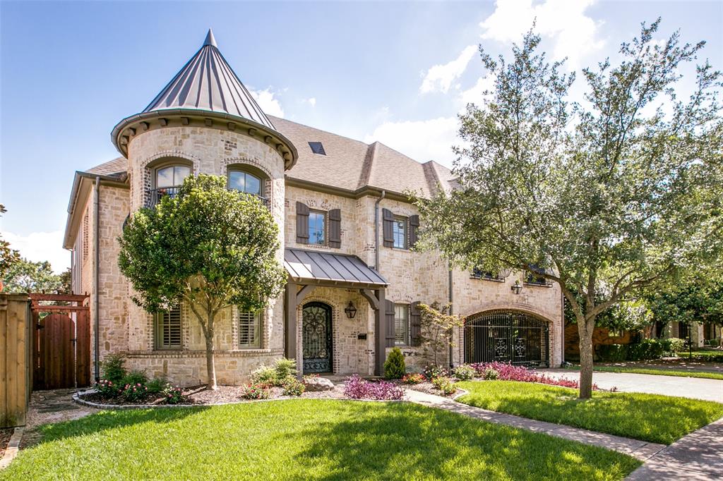 6540 Sondra Drive Dallas, TX 75214 - Photo 1 of 1 a front view of a house with garden