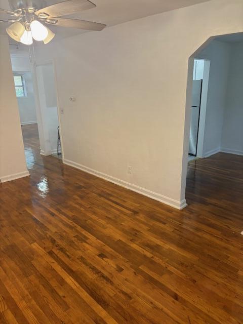 102 Carver Avenue Northwest Roanoke, VA 24012 - Photo 3 of 14 a view of an empty room with wooden floor and a chandelier