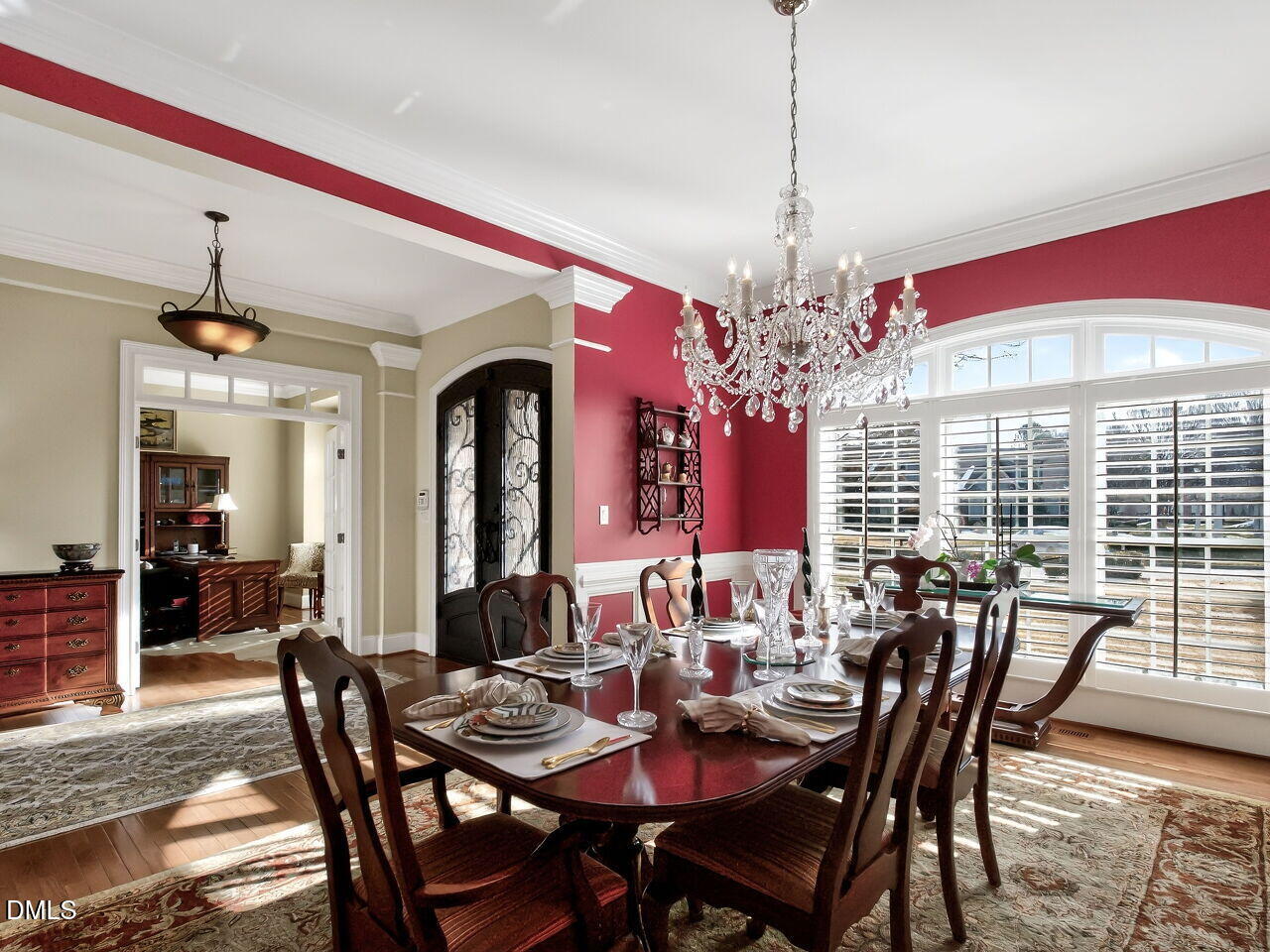 8409 Passage Marseille Court Raleigh, NC 27615 - Photo 15 of 48 a view of a dining room with furniture window and wooden floor