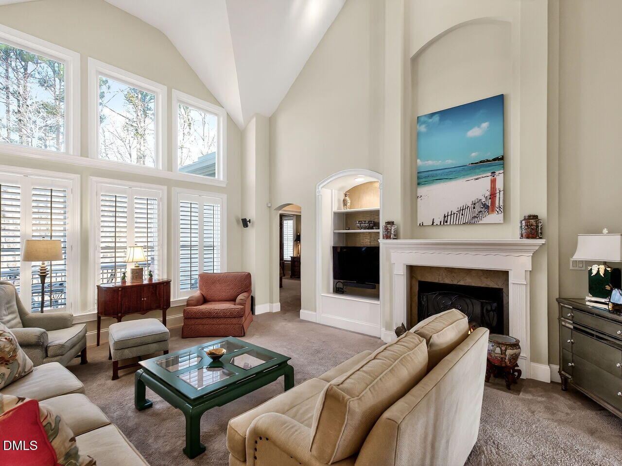 8409 Passage Marseille Court Raleigh, NC 27615 - Photo 16 of 48 a living room with furniture fireplace and window
