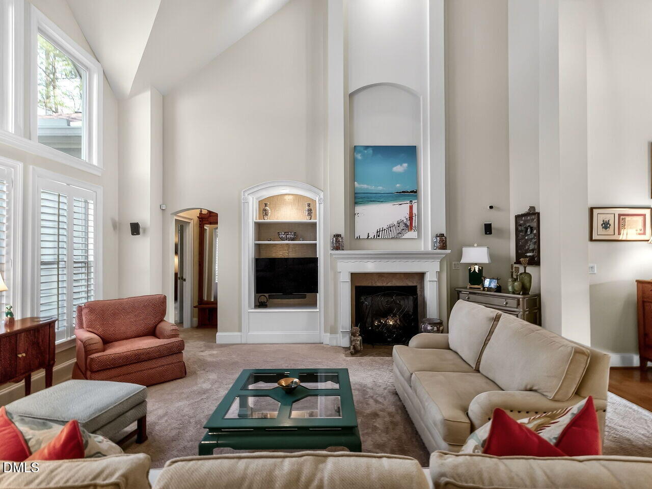 8409 Passage Marseille Court Raleigh, NC 27615 - Photo 19 of 48 a living room with furniture or couch and a fireplace