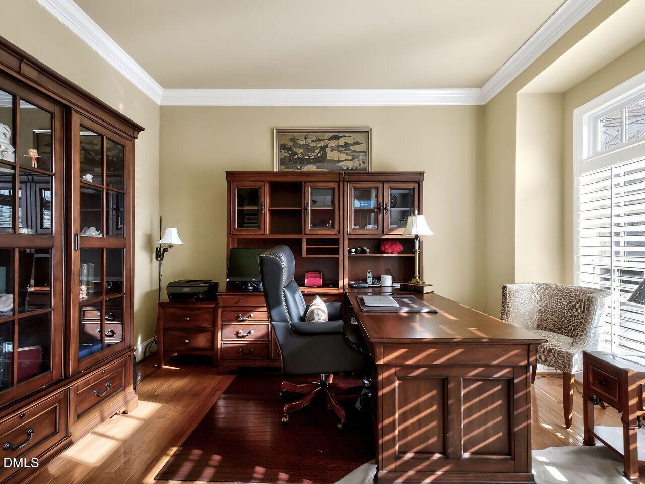 8409 Passage Marseille Court Raleigh, NC 27615 - Photo 20 of 48 a work room with furniture and a potted plant
