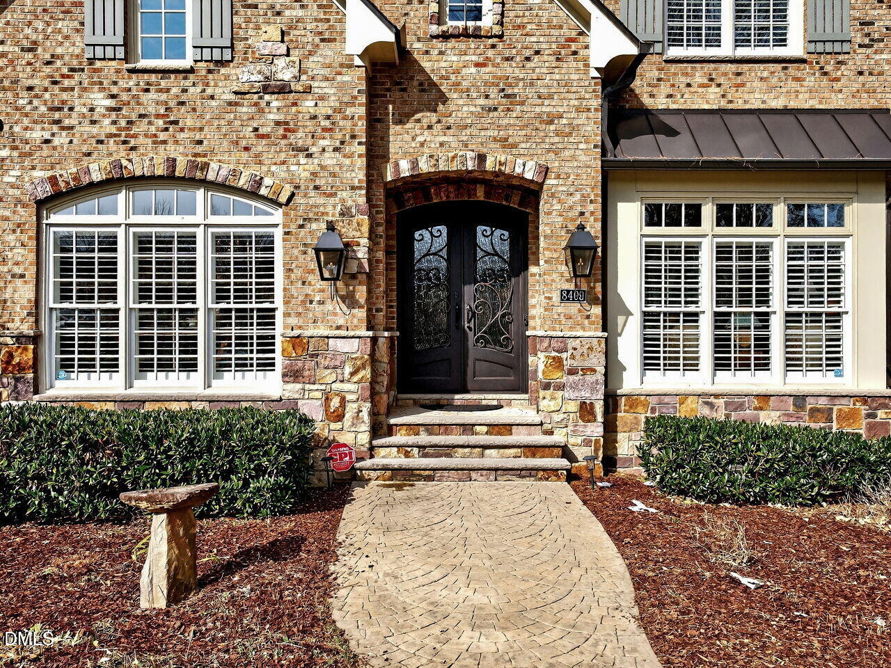8409 Passage Marseille Court Raleigh, NC 27615 - Photo 2 of 48 a front view of a house with a yard
