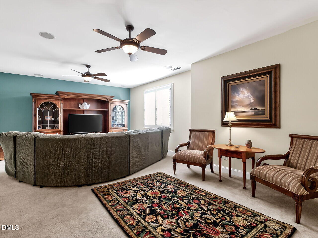 8409 Passage Marseille Court Raleigh, NC 27615 - Photo 31 of 48 a living room with furniture and a rug