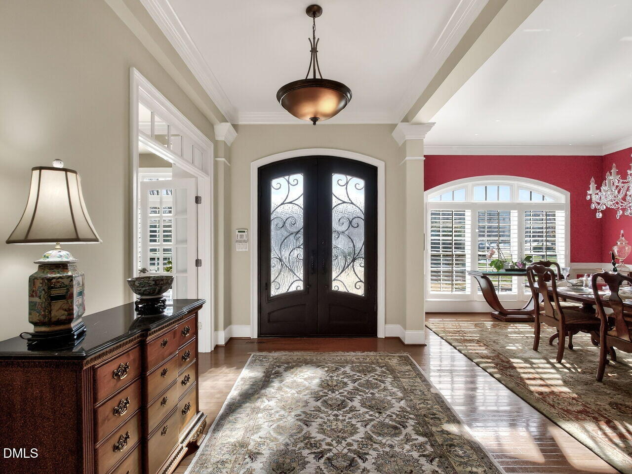 8409 Passage Marseille Court Raleigh, NC 27615 - Photo 3 of 48 a living room with furniture and a large window