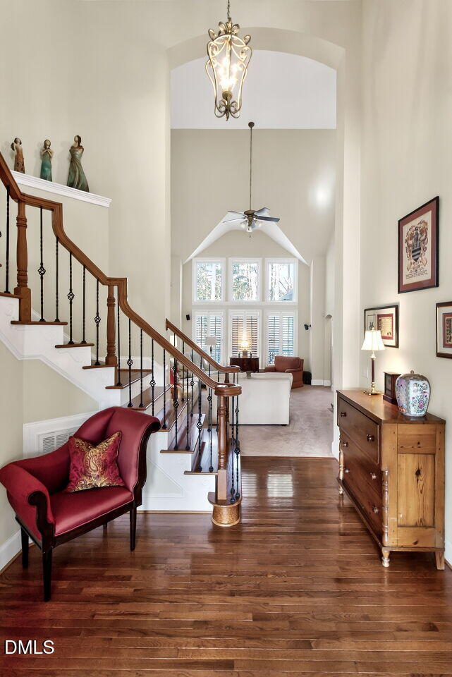 8409 Passage Marseille Court Raleigh, NC 27615 - Photo 4 of 48 a view of a livingroom with furniture a chandelier