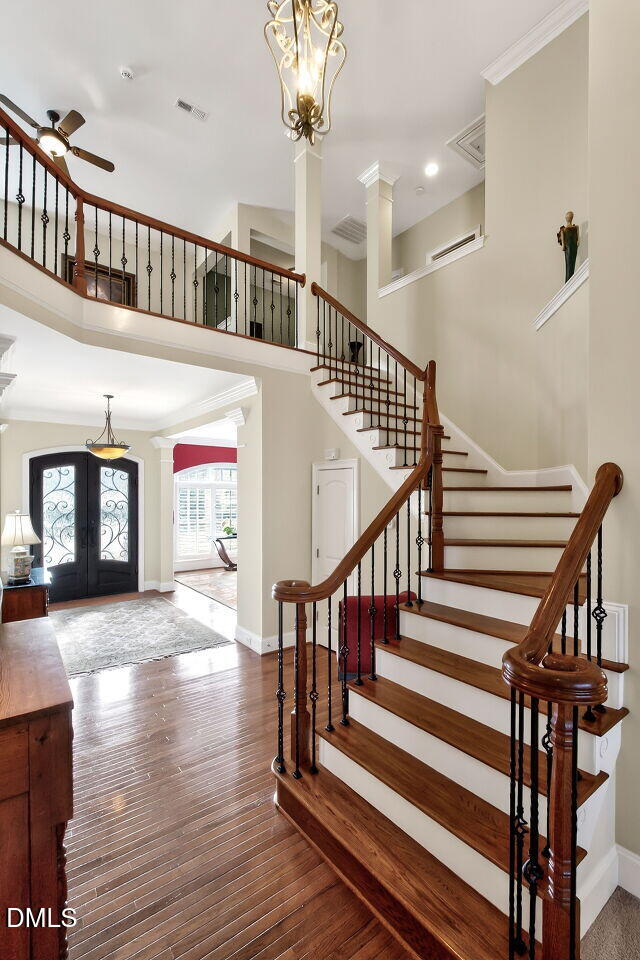 8409 Passage Marseille Court Raleigh, NC 27615 - Photo 5 of 48 a view of entryway livingroom and hall with wooden floor