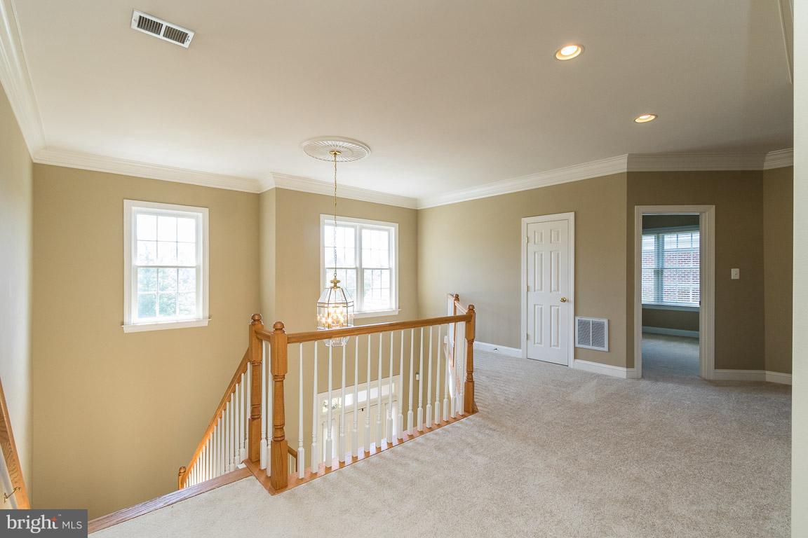 8217 Roxborough Loop Gainesville, VA 20155 - Photo 13 of 30 Spacious Upstairs Hallway