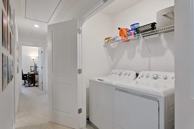 a utility room with dryer and washer