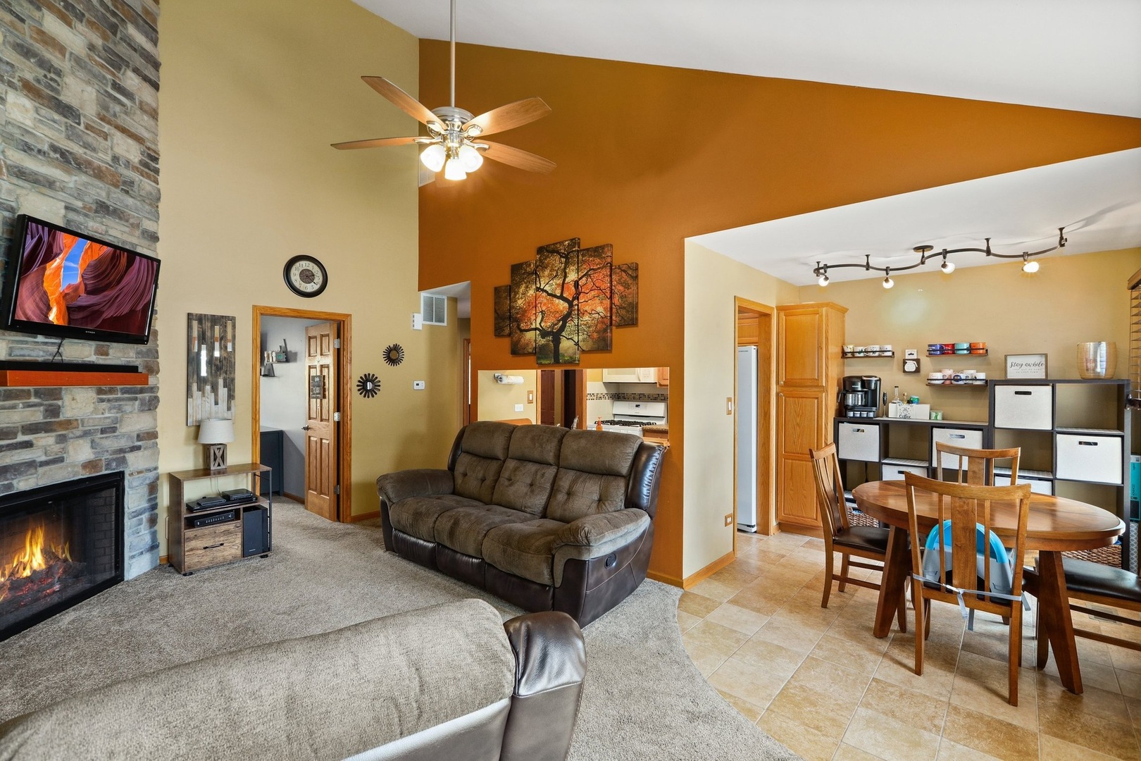 751 Taft Circle Hanover Park, IL 60133 - Photo 3 of 14 a living room with furniture and a flat screen tv