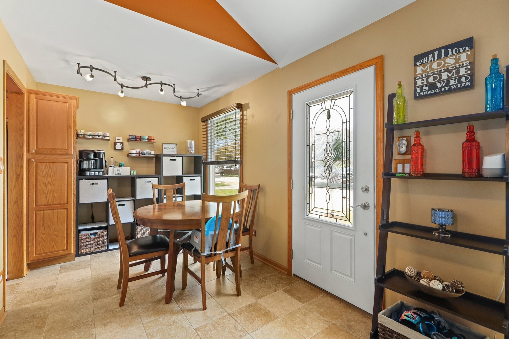751 Taft Circle Hanover Park, IL 60133 - Photo 5 of 14 a dining room with furniture and a window