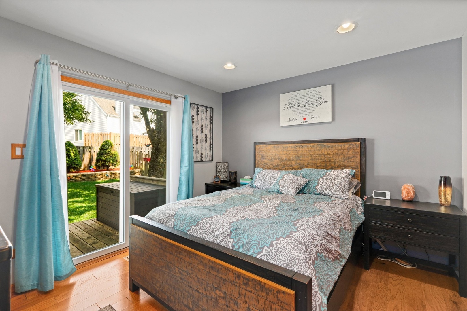 751 Taft Circle Hanover Park, IL 60133 - Photo 7 of 14 a bedroom with a bed and a dresser next to a window