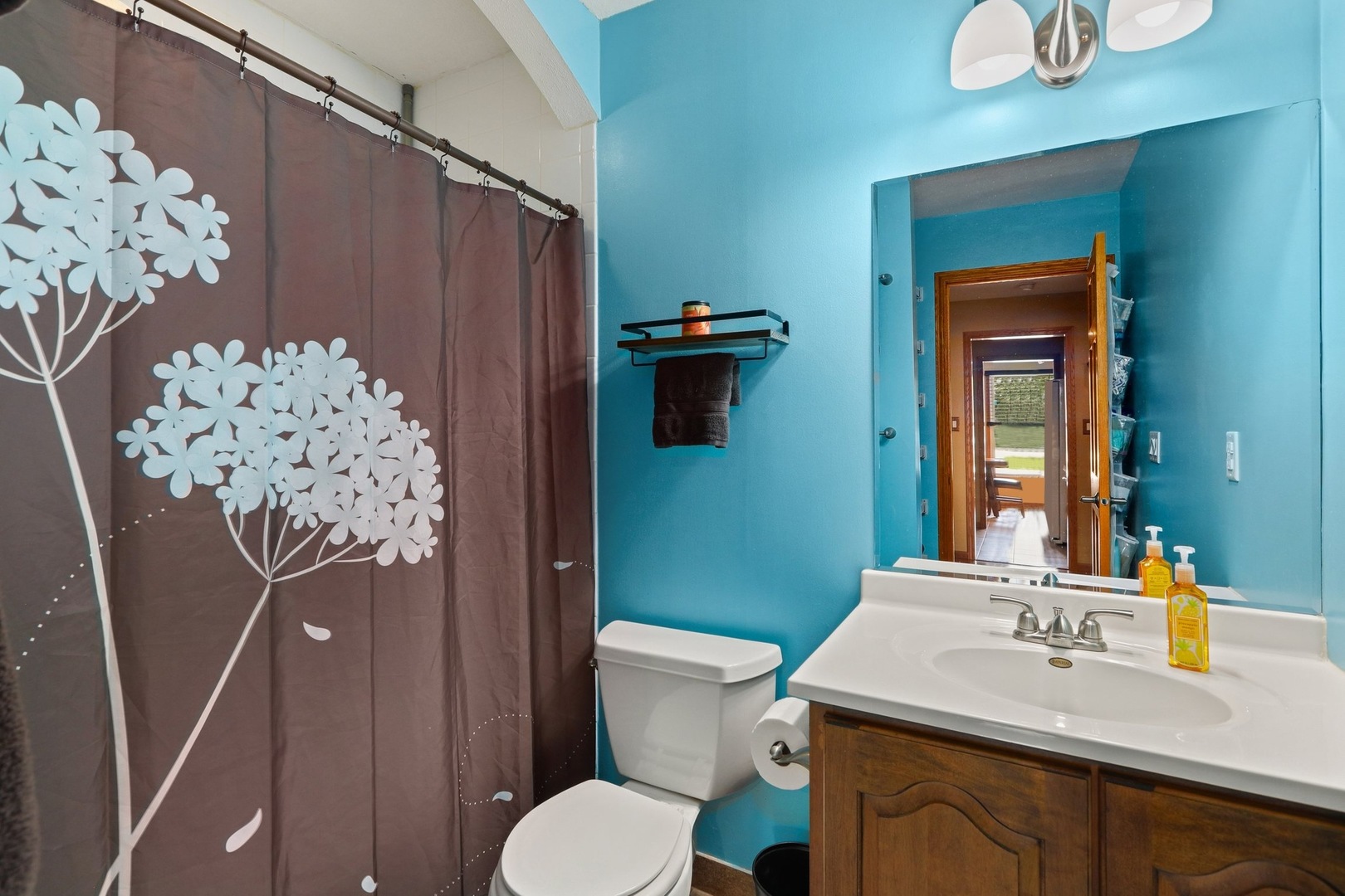 751 Taft Circle Hanover Park, IL 60133 - Photo 8 of 14 a bathroom with a sink toilet and shower