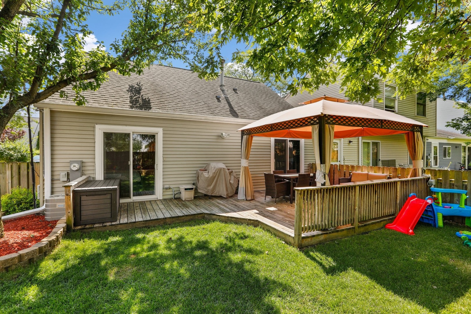 751 Taft Circle Hanover Park, IL 60133 - Photo 10 of 14 a view of house with backyard