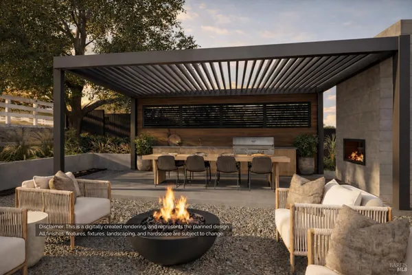 a view of a patio with a table chairs and a fire pit