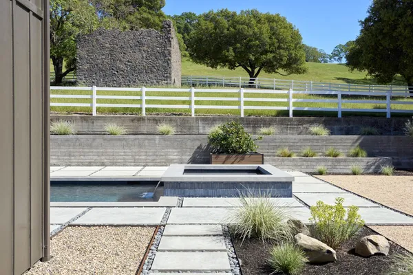 a front view of house with yard outdoor seating and green space