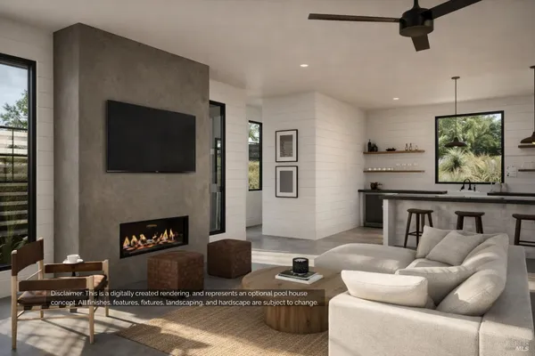 a living room with fireplace furniture and a large window