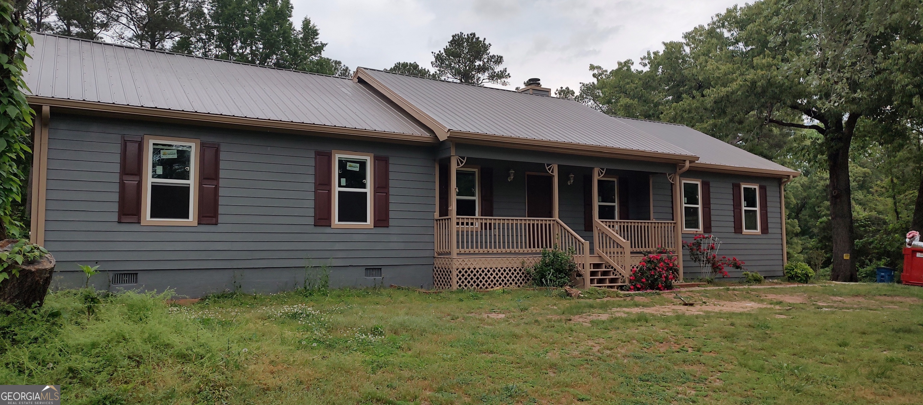 356 Mays Road Stockbridge, GA 30281 - Photo 1 of 9 a front view of a house with garden