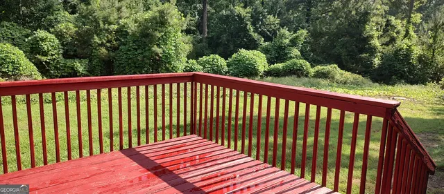 a view of a wooden roof deck