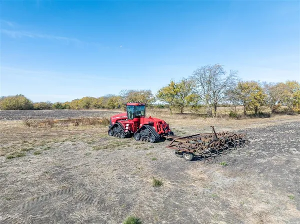 a view of a yard with an outdoor space