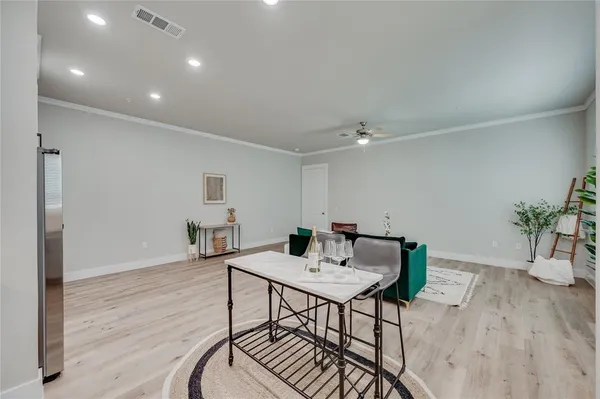 a workspace with furniture and wooden floor