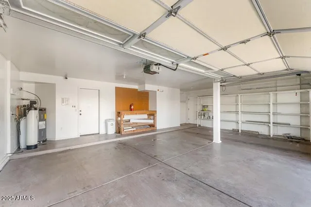 a view of a livingroom with closet and windows