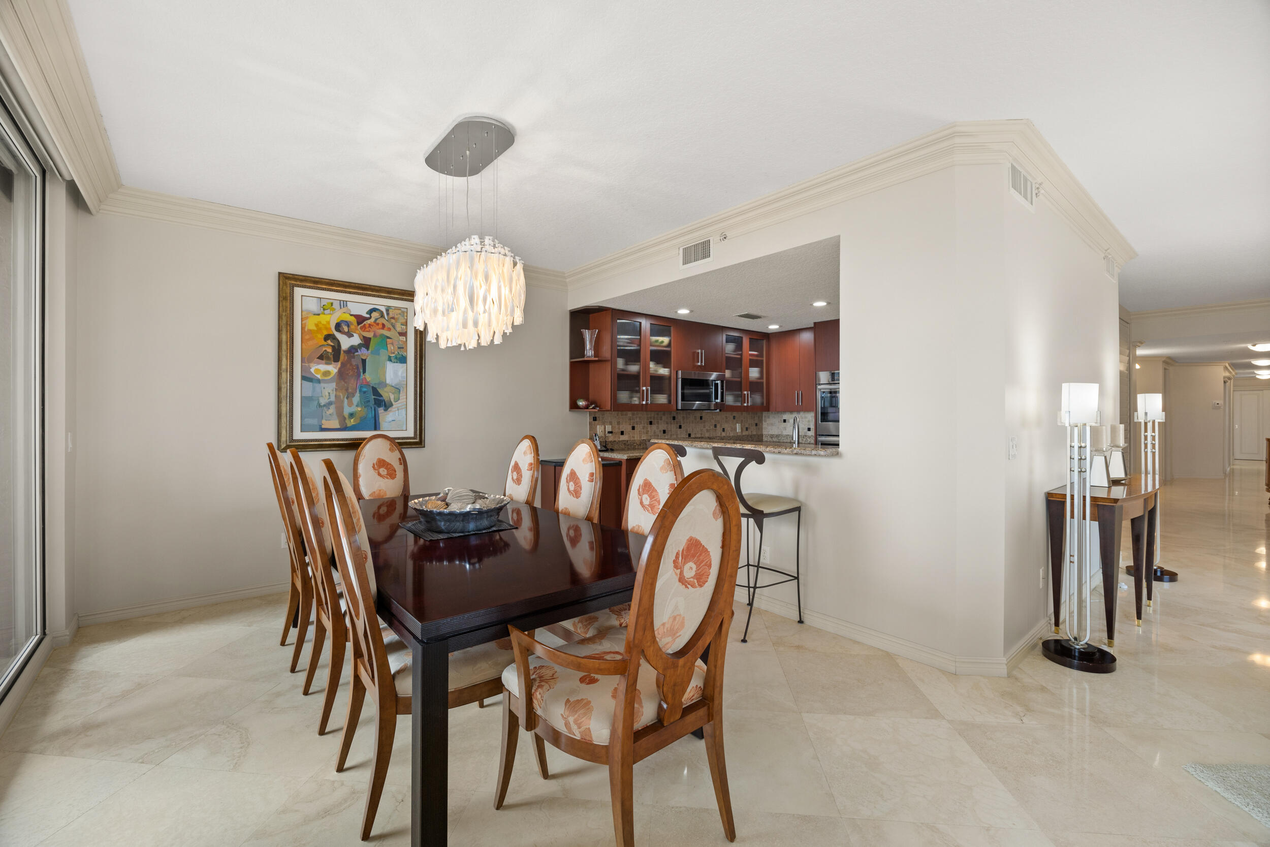 700 Ocean Royale, Unit 601 Juno Beach, FL 33408 - Photo 14 of 56 Dining area w/designer chandelier