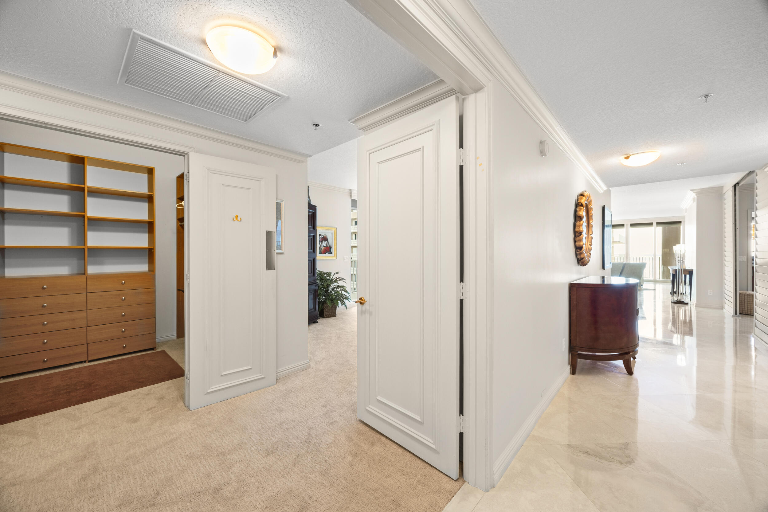 700 Ocean Royale, Unit 601 Juno Beach, FL 33408 - Photo 20 of 56 Double door entry to primary suite