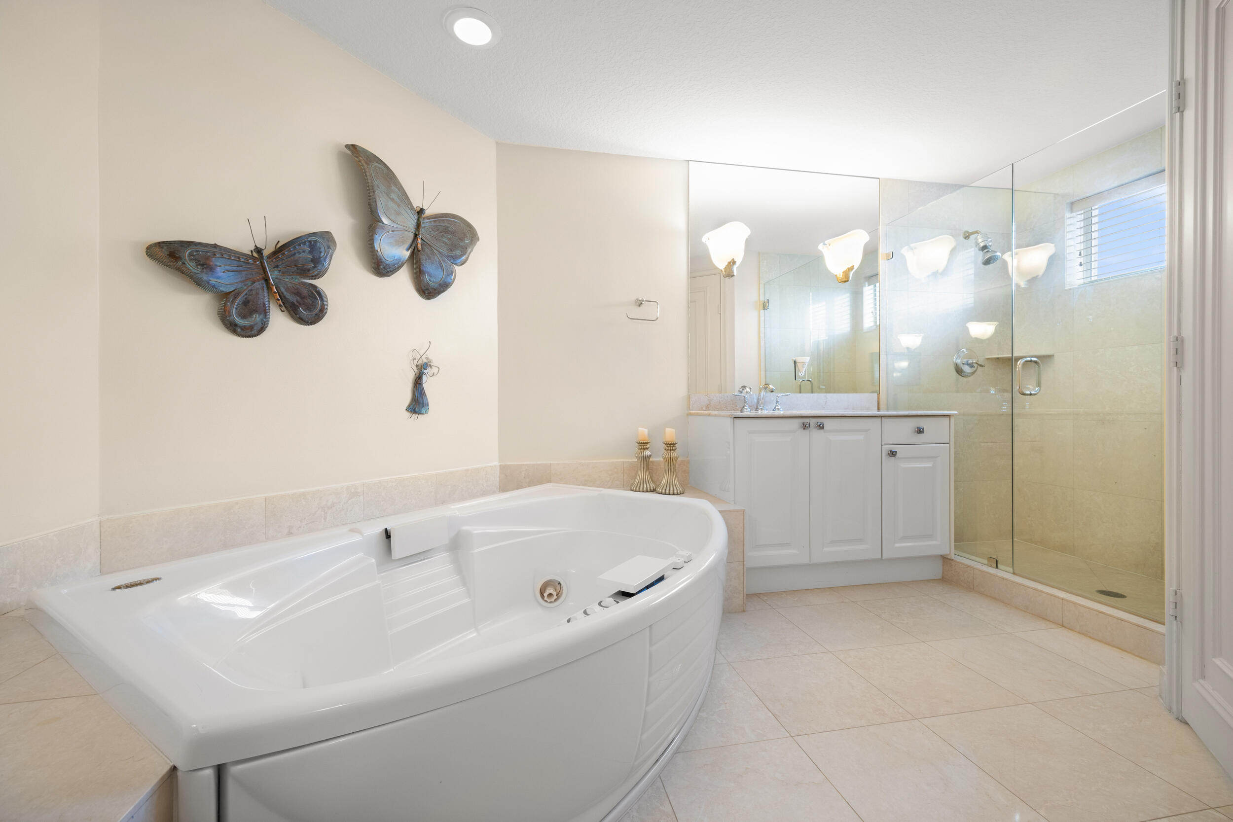 700 Ocean Royale, Unit 601 Juno Beach, FL 33408 - Photo 26 of 56 Dual vanity, spa tub & walk-in shower