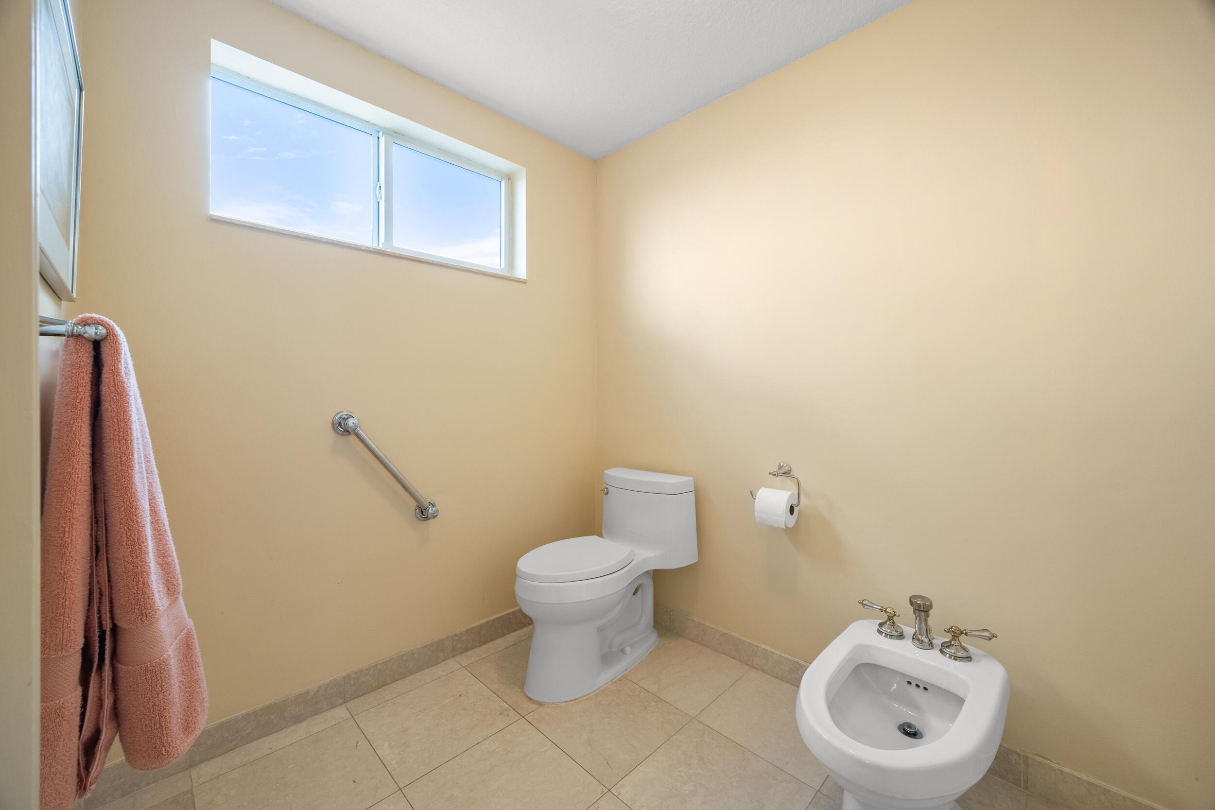 700 Ocean Royale, Unit 601 Juno Beach, FL 33408 - Photo 28 of 56 Primary bath water closet
