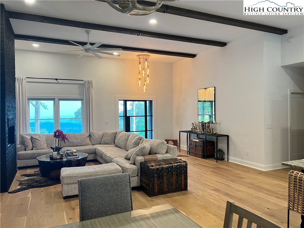 1701 Wildcat Road Deep Gap, NC 28618 - Photo 8 of 32 a living room with furniture and a large window