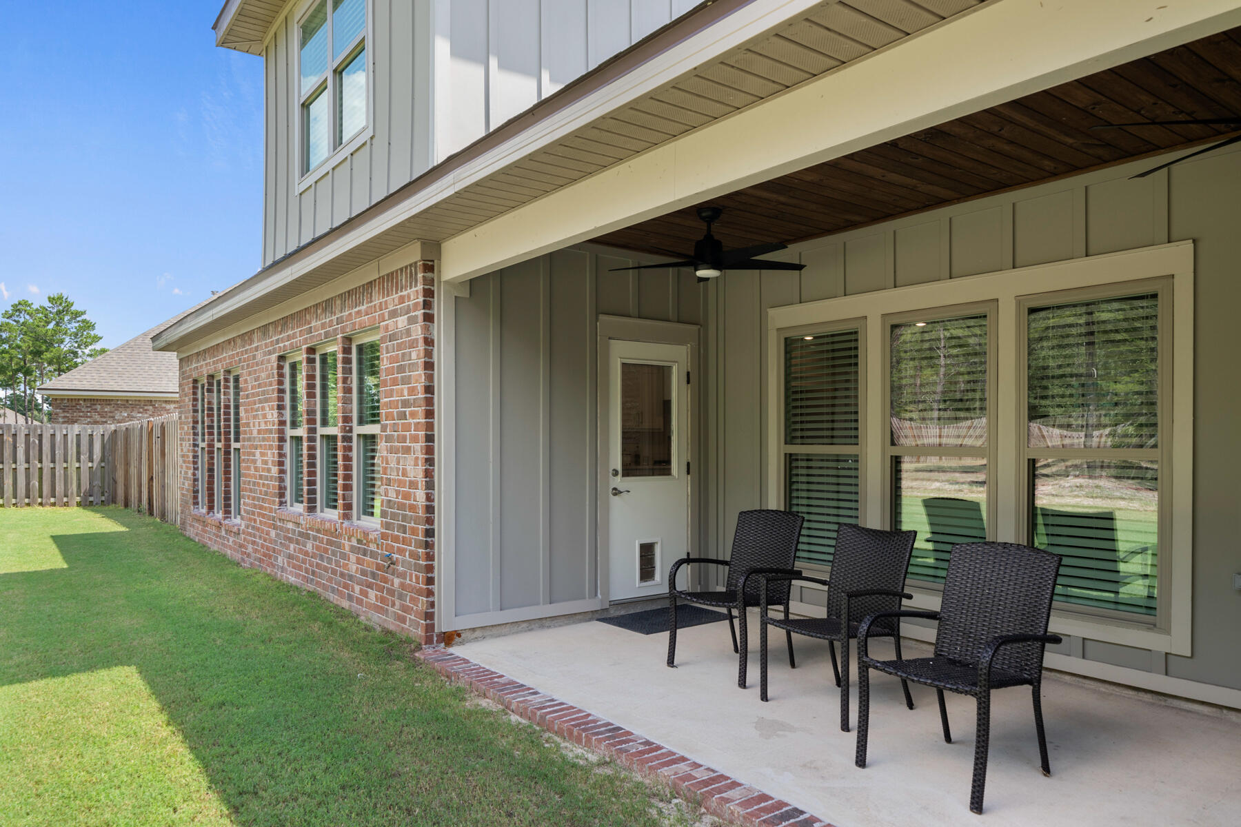 301 Mill Pond Cove Freeport, FL 32439 - Photo 12 of 55 a view of a house with backyard and sitting area