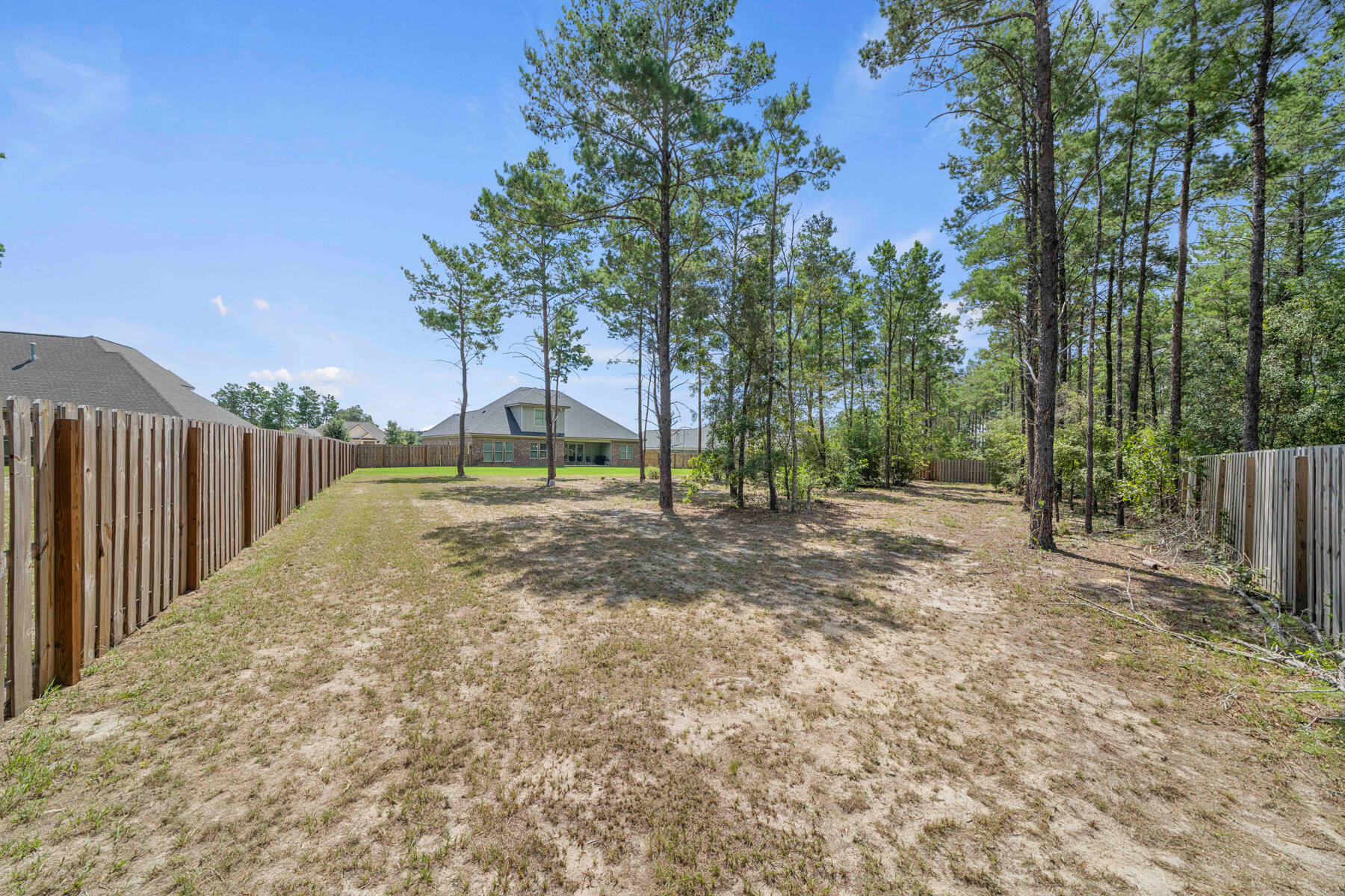 301 Mill Pond Cove Freeport, FL 32439 - Photo 16 of 55 a view of backyard with green space