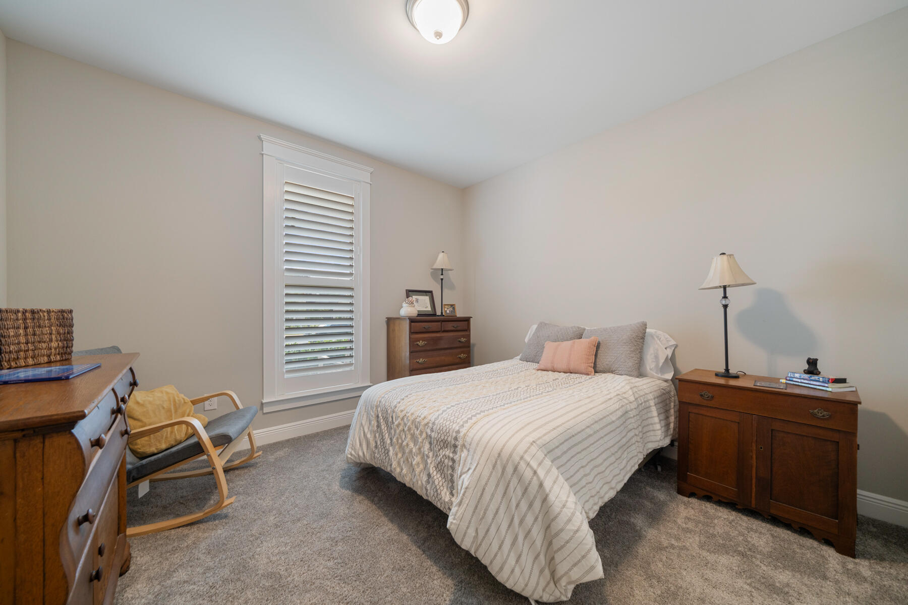 301 Mill Pond Cove Freeport, FL 32439 - Photo 28 of 55 a bedroom with a bed and a window