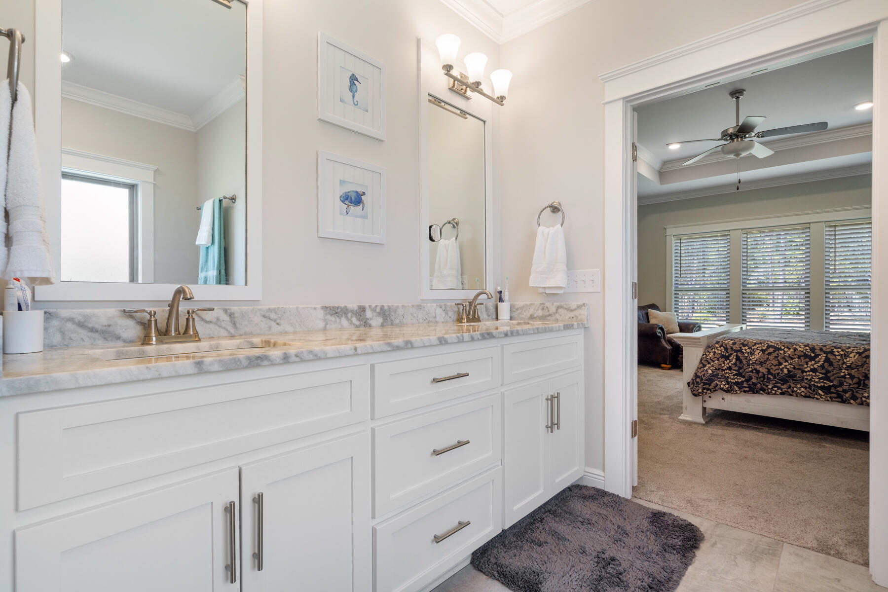 301 Mill Pond Cove Freeport, FL 32439 - Photo 41 of 55 a en suite bathroom with double sink and a mirror